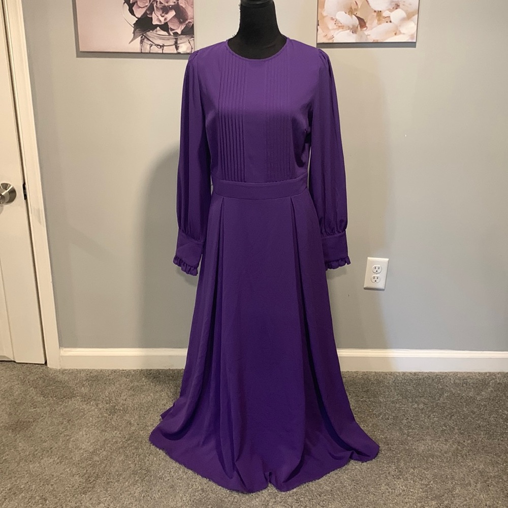 Purple full length, pleated dress.